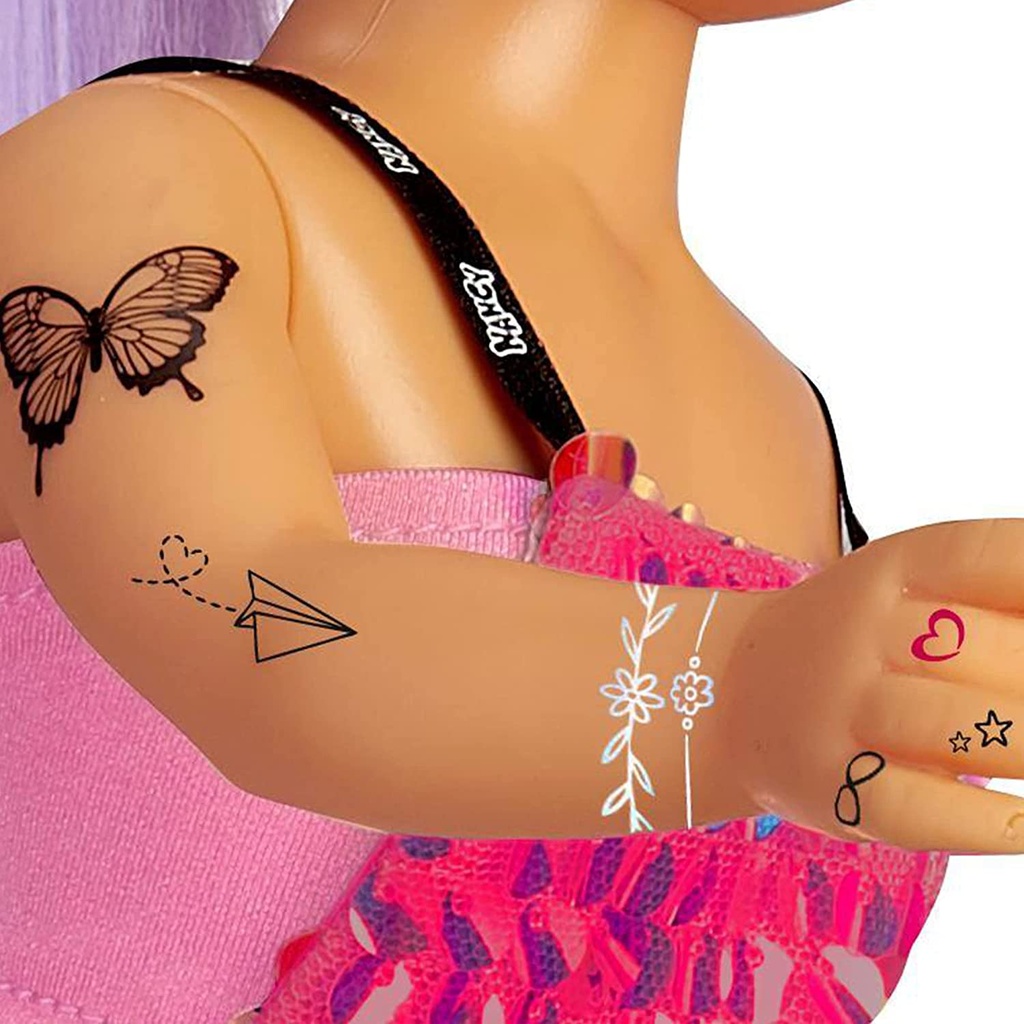 NANCY CADA DIA UN TATTOO