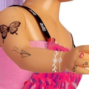 NANCY CADA DIA UN TATTOO