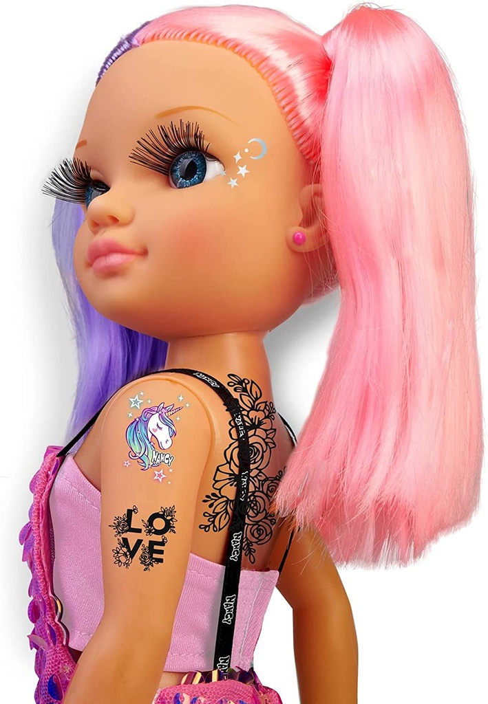 NANCY CADA DIA UN TATTOO